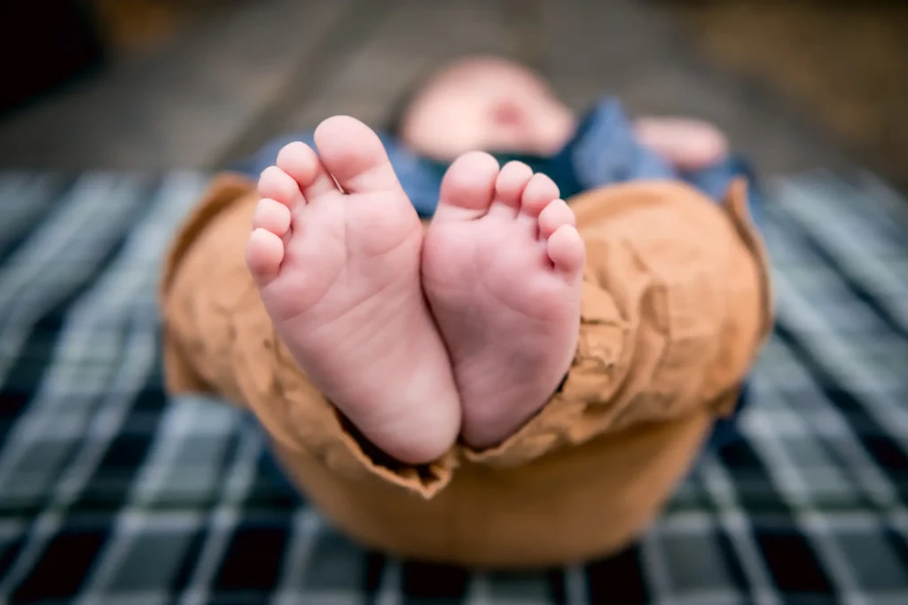 portrait of newborn baby feet photographed by Shelly Rivoli