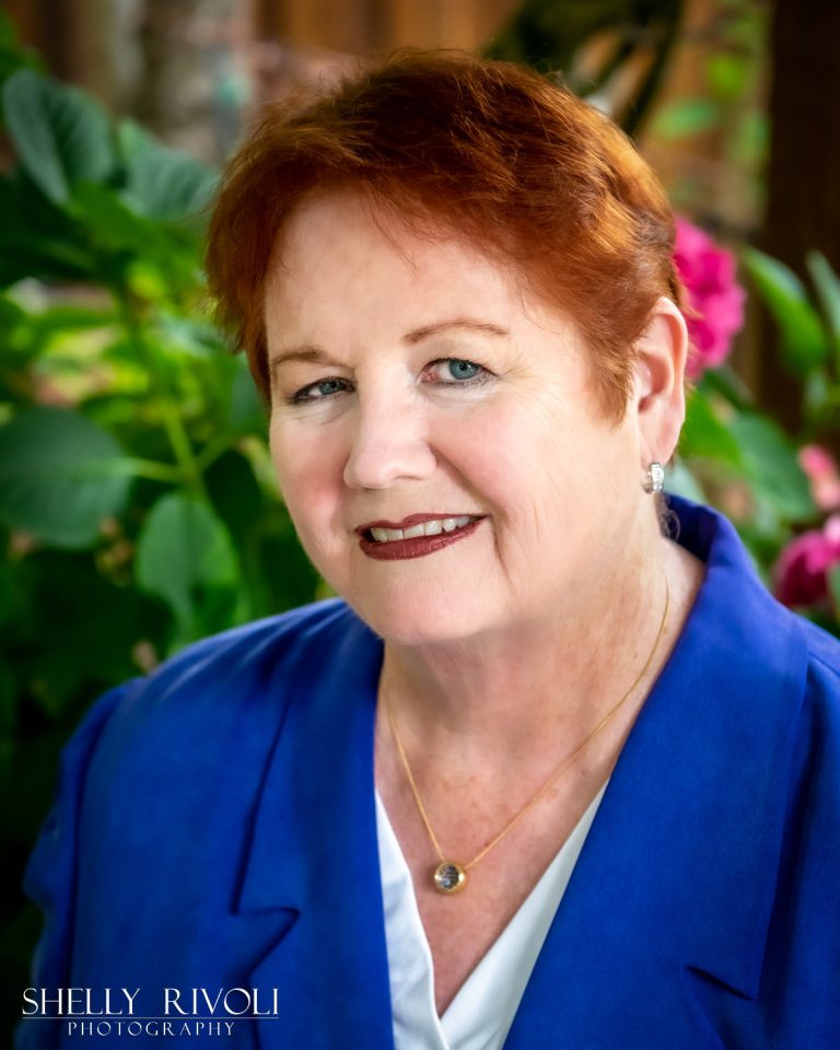 Business portrait of woman by Bay Area photographer Shelly Rivoli